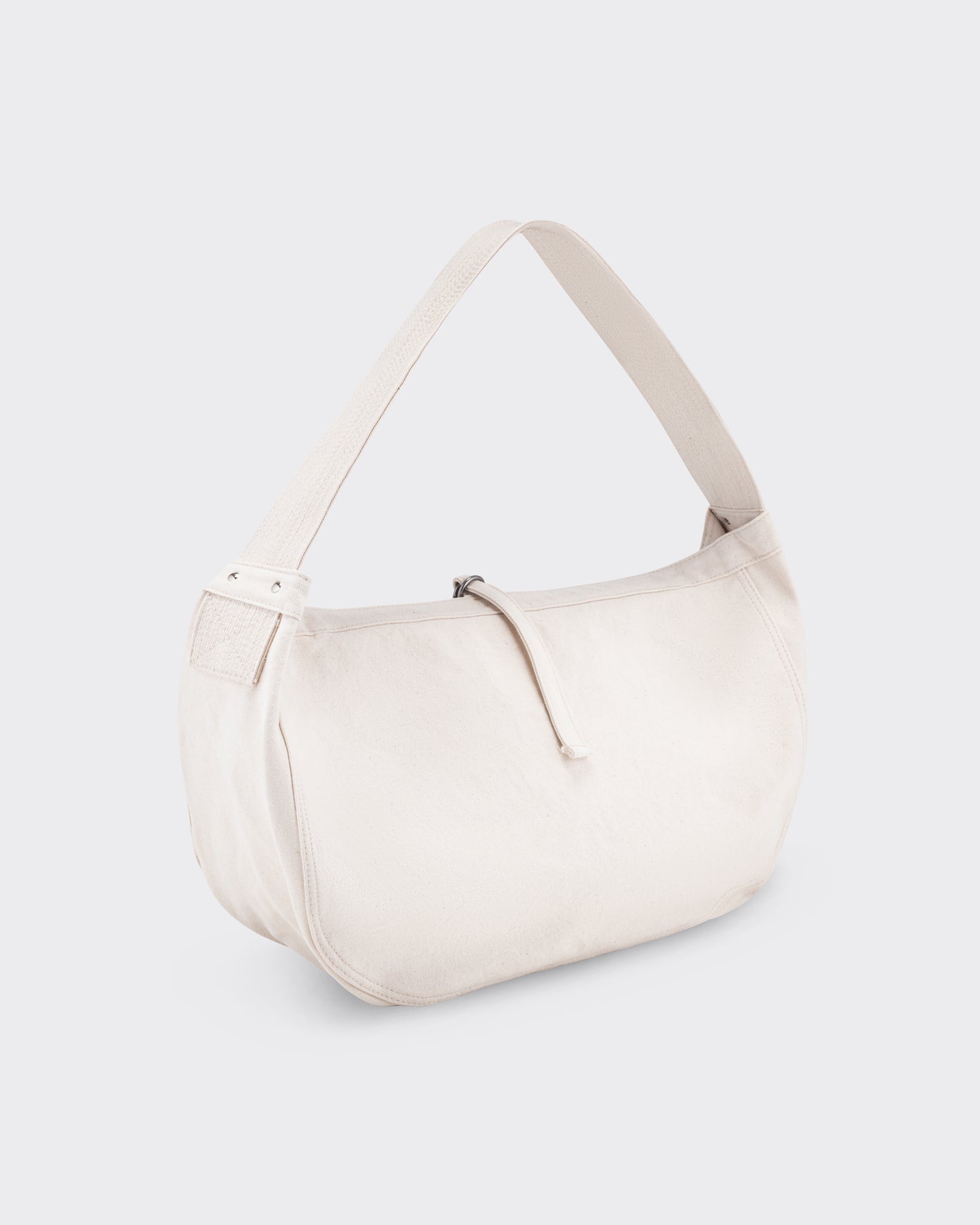 Sac Newsboy T.T Lot.004, vue de profil, soufflet large et rivets en fer brut