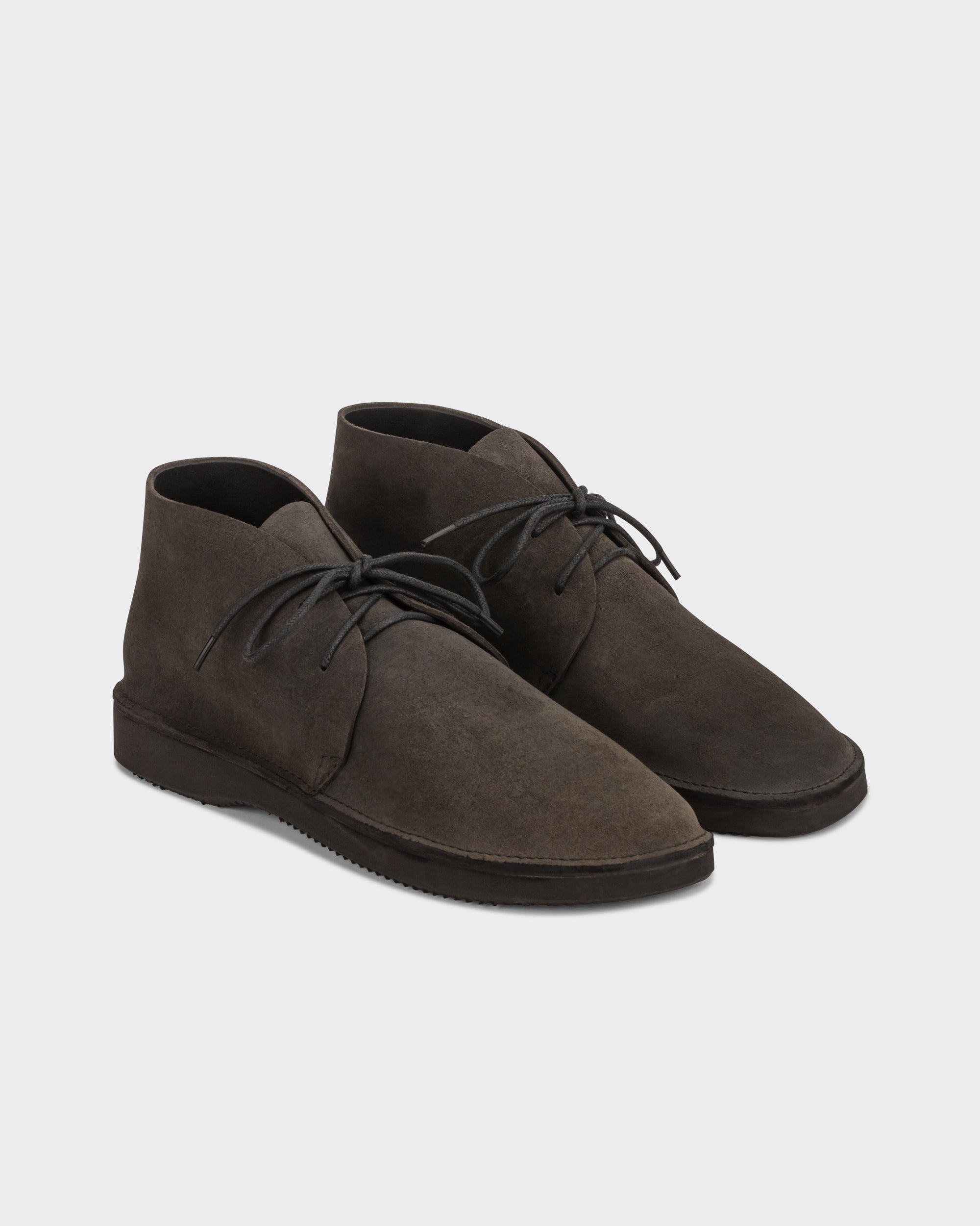Aurora for BEIGE North Pacific chukka boots in charcoal Horween roughout leather, three quarter view