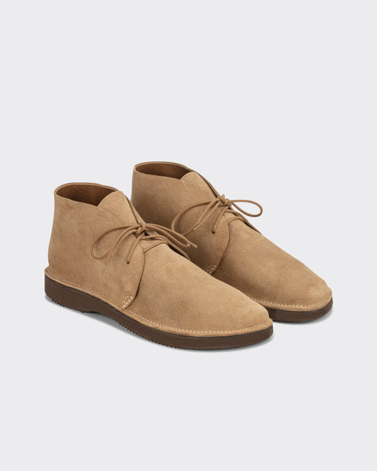 Aurora for BEIGE North Pacific chukka boots in sand Horween Marine Field leather, three quarter view