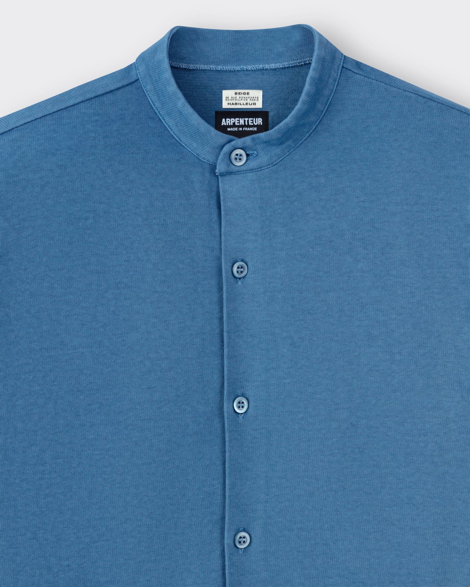 Arpenteur Opto long-sleeve Rachel knit shirt in pastel detail of band collar and mother-of-pearl buttons at Beige Habilleur Paris