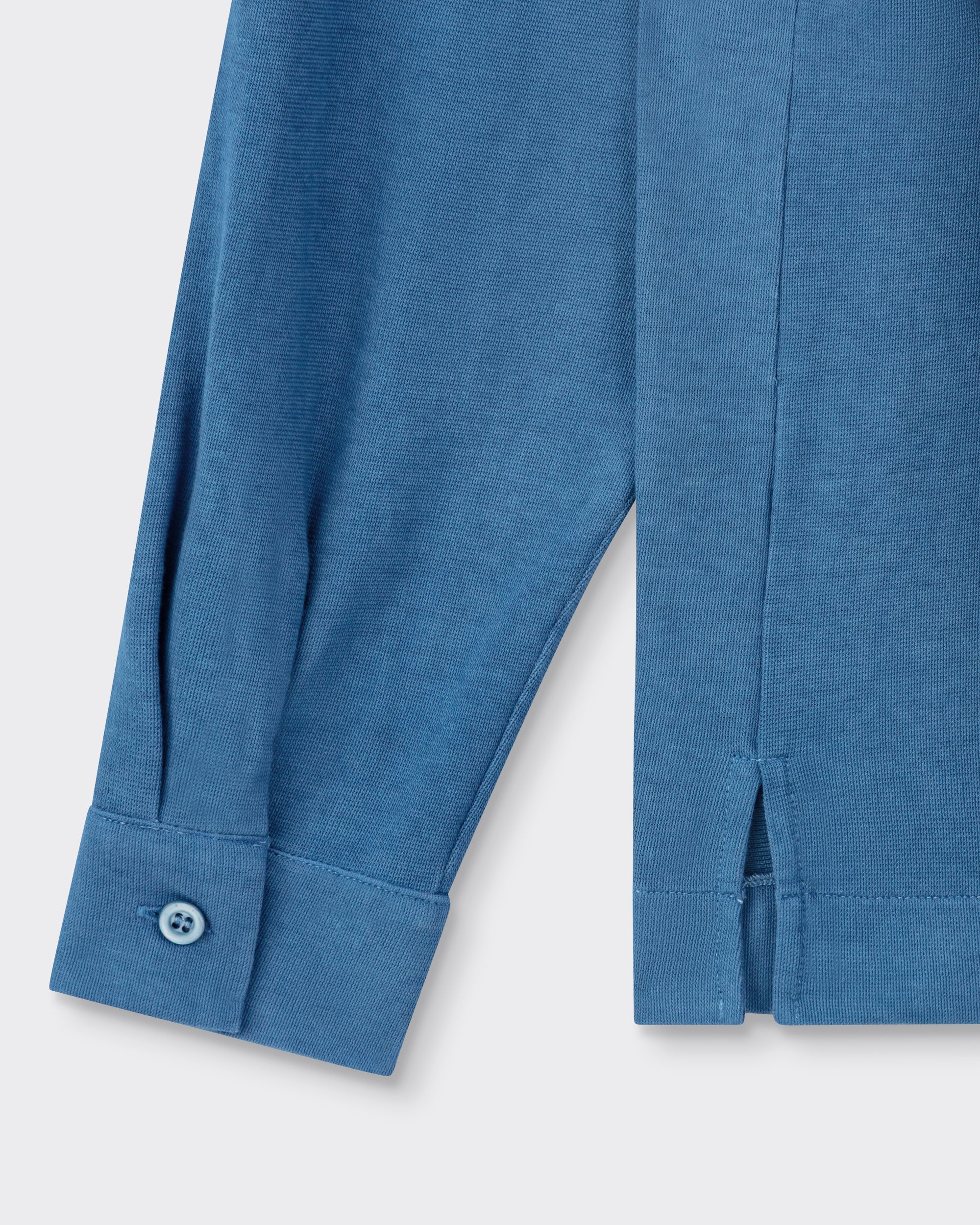 Arpenteur Opto long-sleeve Rachel knit shirt in pastel detail of cuff and side hem vent at Beige Habilleur Paris