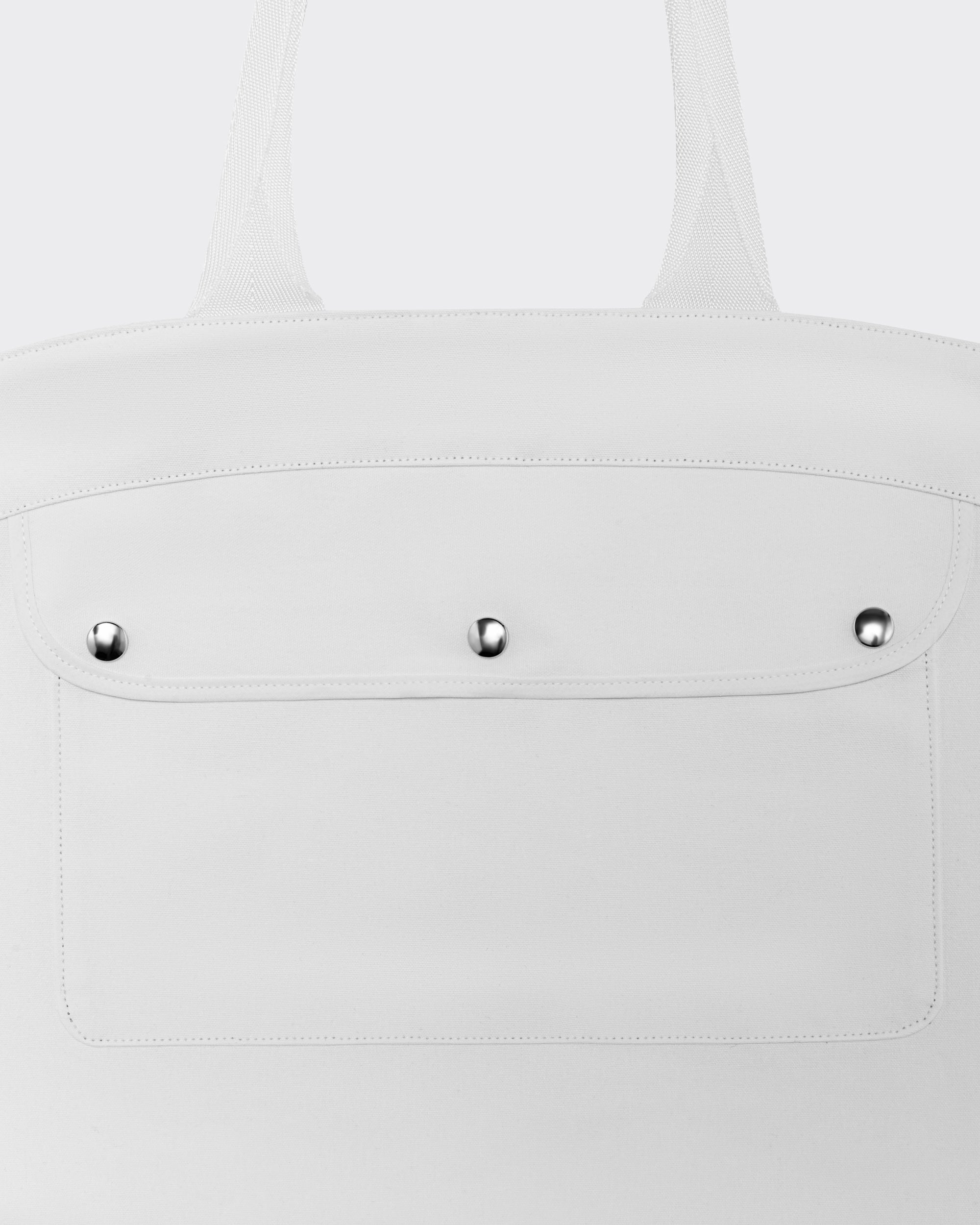 Large interior pocket with snap button – Minitet bag
