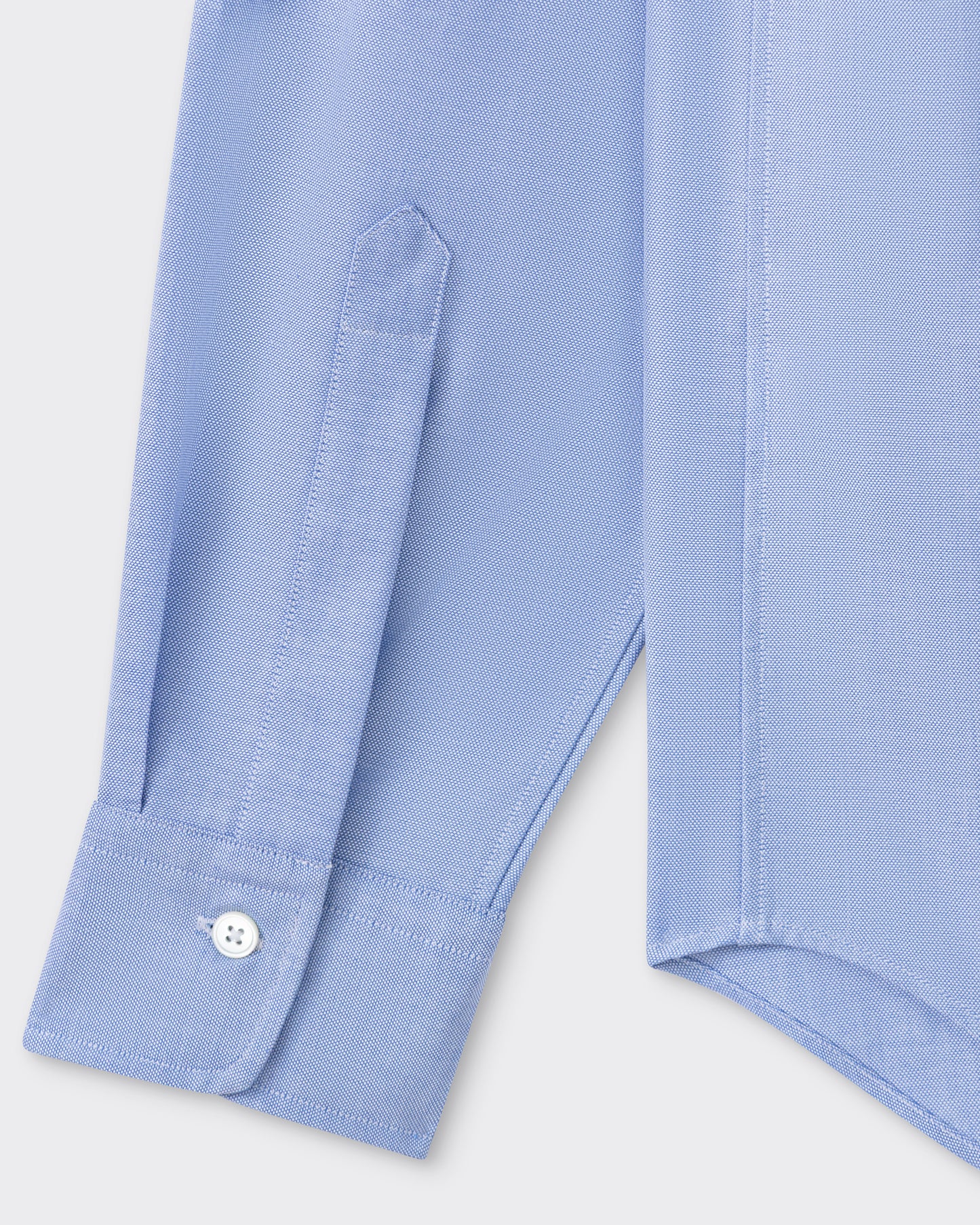 Cuff detail with mother-of-pearl button, sky blue OCBD shirt, BEIGE HABILLEUR PARIS