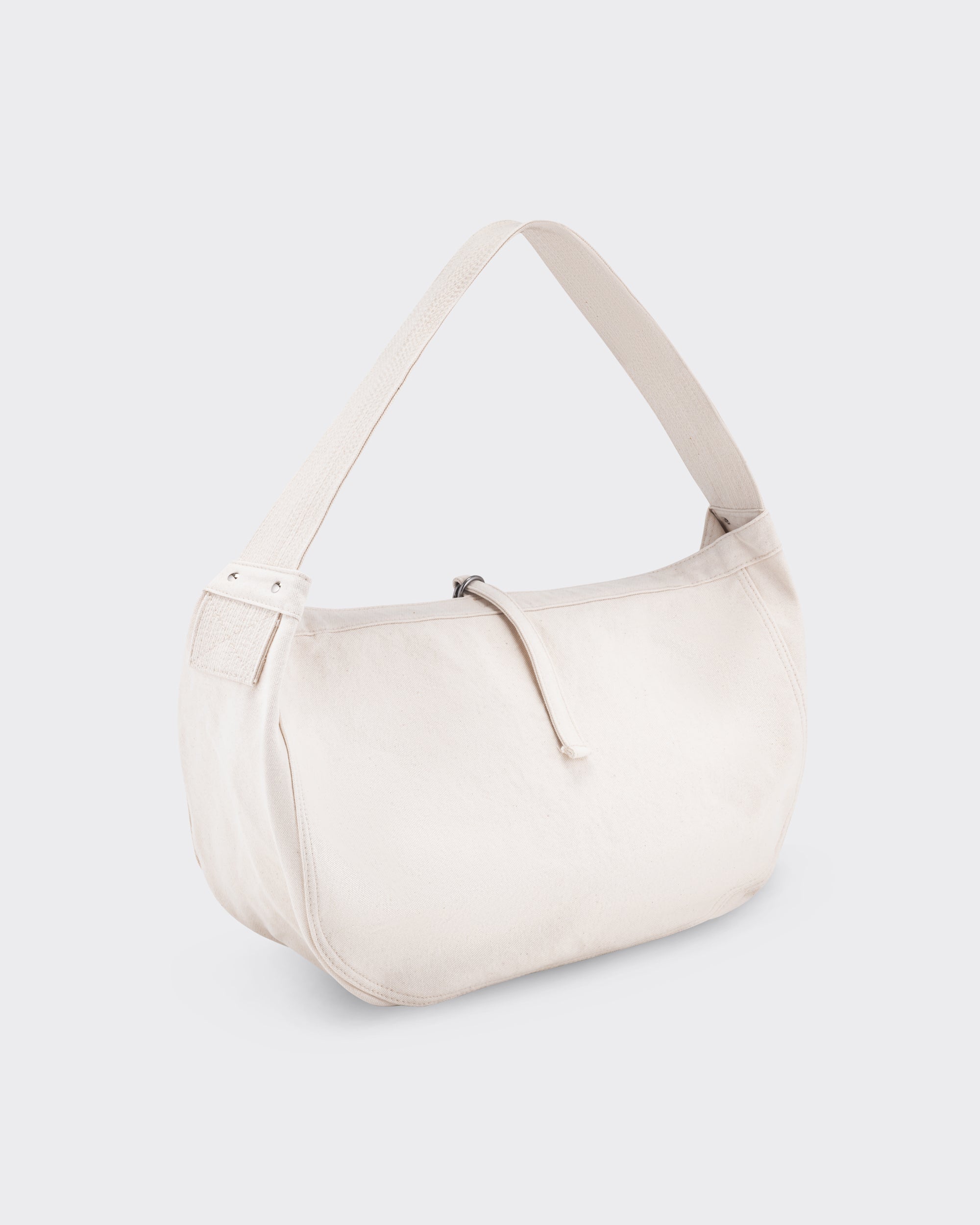 Sac Newsboy T.T Lot.004, vue de profil, soufflet large et rivets en fer brut