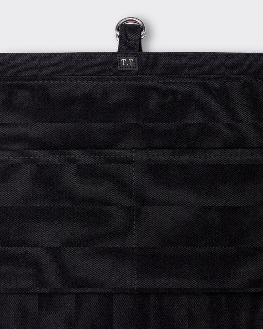 Sac Newsboy T.T Lot.004 NOIR, détail, soufflet large et rivets en fer brut