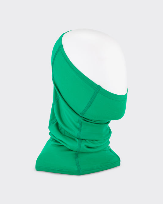 RIER wool jersey neck warmer in emerald green, worn on a mannequin