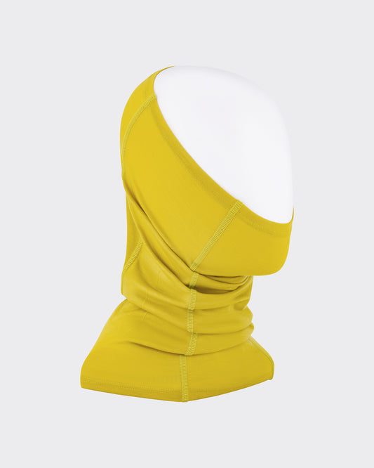 RIER wool jersey neck warmer in Wax mustard yellow, worn on a mannequin