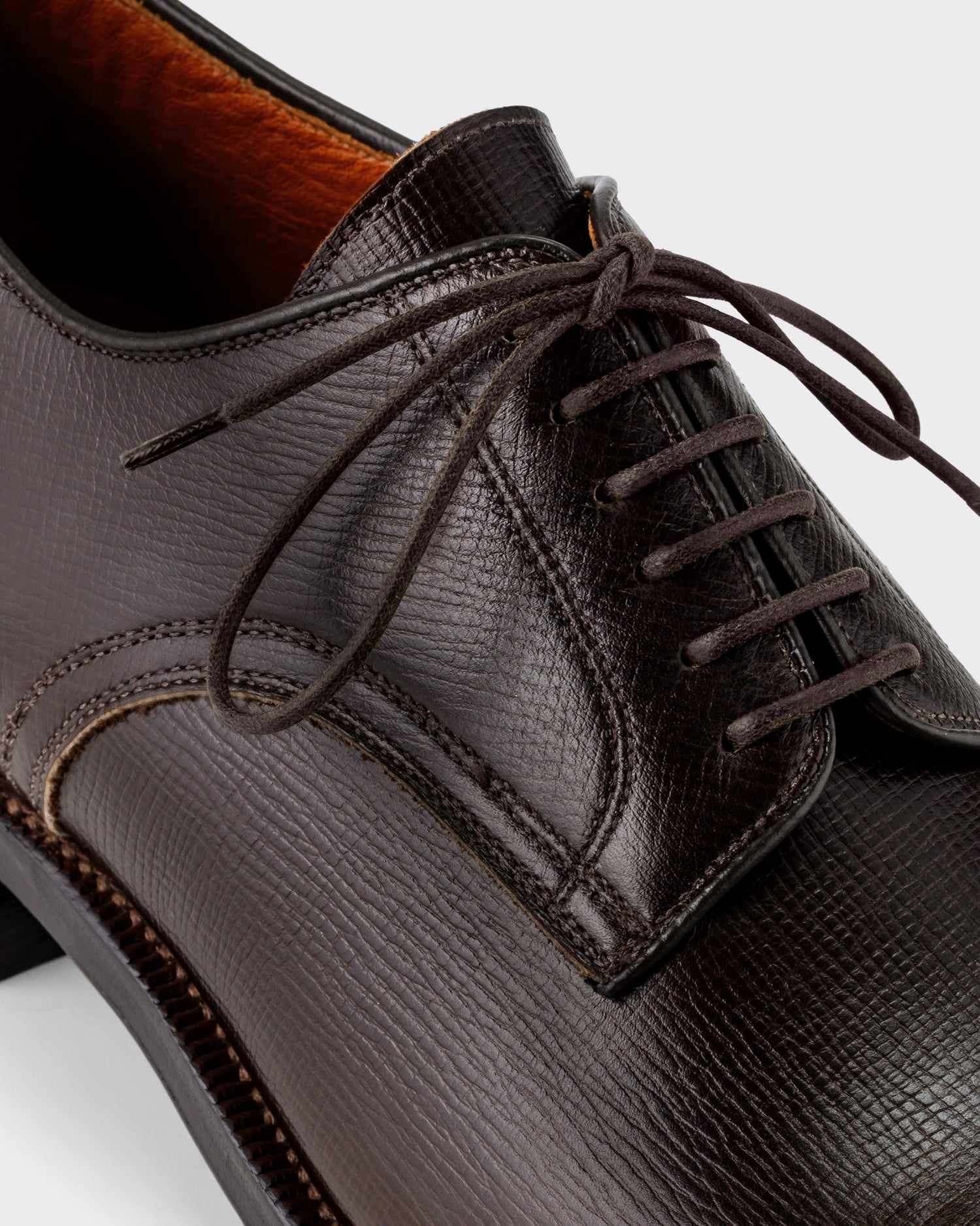Viberg Navvy Cut Derby in malt brown Alcazar grained calf, close-up of the leather grain